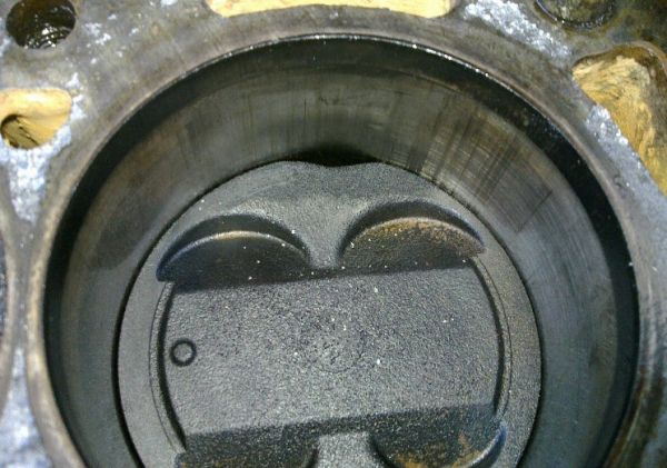 burned_4AGE_high_comp_piston.jpg