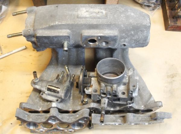 manifold_and_throttle_body_before_soda_blasting.jpg
